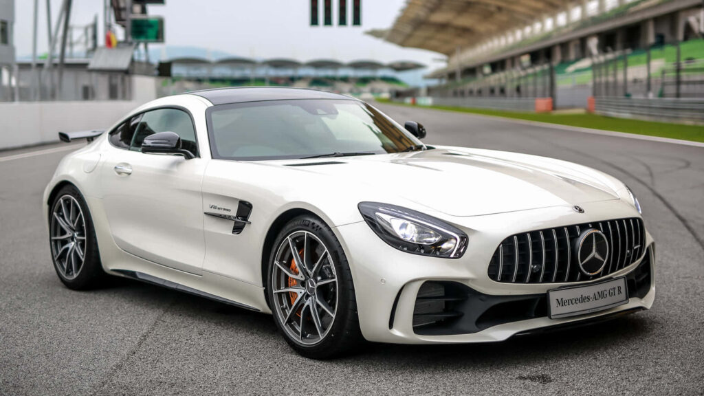 Mercedes AMG GT R 2017 white sports car on racetrack sleek design high performance wallpaper
