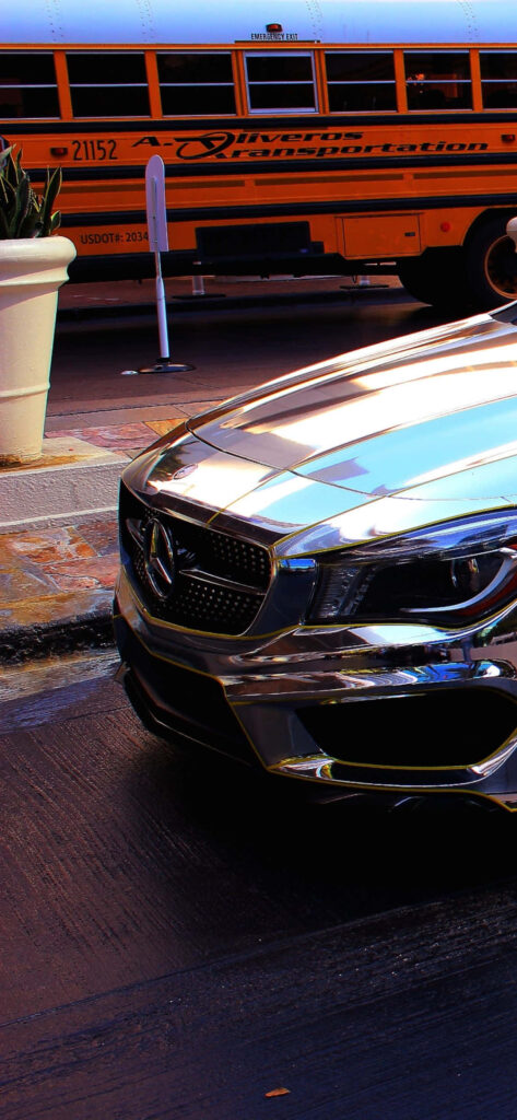 Mercedes-Benz A-Class light grey parked city street reflecting urban surroundings wallpaper