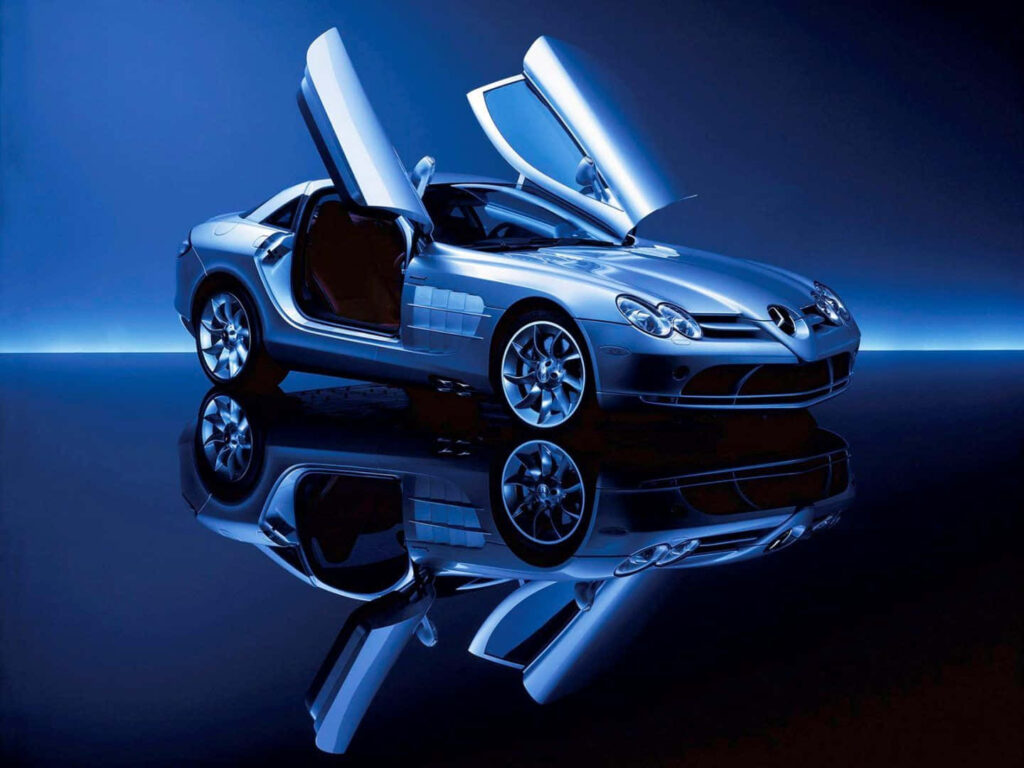 Mercedes Benz gullwing doors open blue lighting sleek diamond design reflective wallpaper background