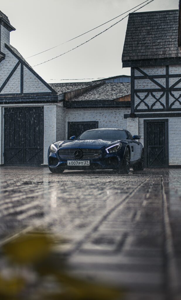 Mercedes-Benz Sports Car Wallpaper: Sleek Design & Rustic Backdrop