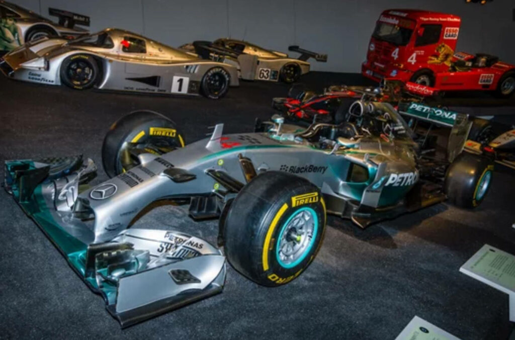 Mercedes F1 car in 4K showcasing sleek aerodynamics and high-speed racing design wallpaper