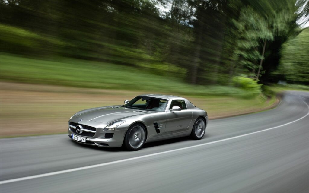 Sleek Mercedes SLS 63 AMG Racing: Acceleration & Speed Wallpaper