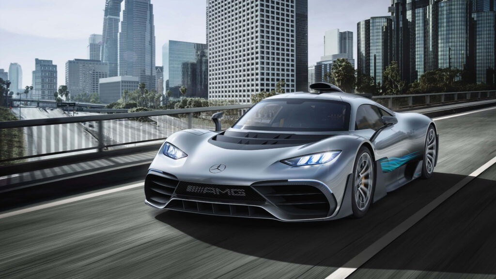 Mercedes-AMG speeding on urban highway with skyscrapers 4k wallpaper dynamic racing car