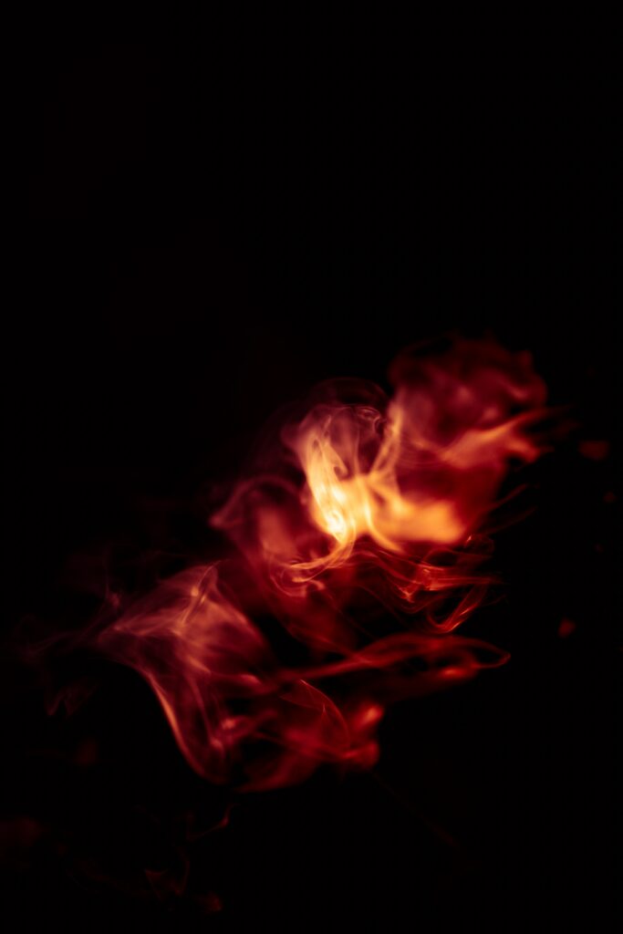 Stunning 3648x5472 Wallpaper: Glowing Fiery Smoke on Dark Background