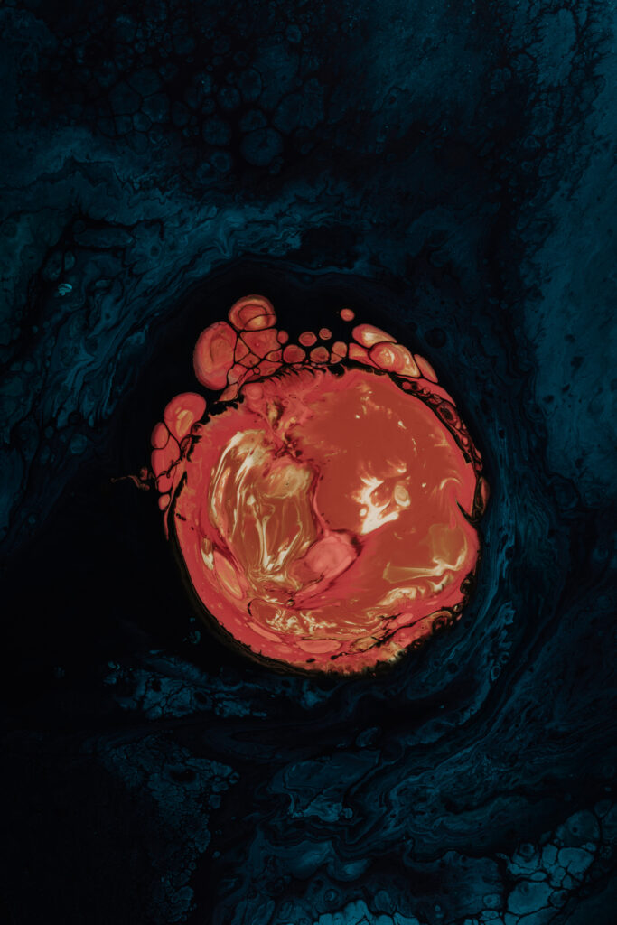Mesmerizing Macro Wallpaper: Red & Orange Bubbles on Dark Background