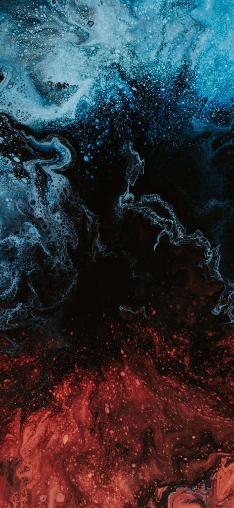 Abstract fluid art wallpaper with vibrant blue and red marble on a dark sleek background