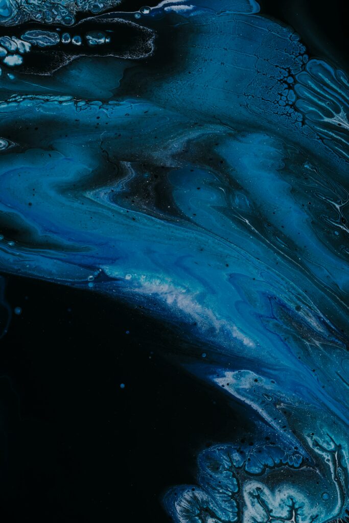 Mesmerizing Abstract Fluid Art Wallpaper: Deep Blue on Dark Background