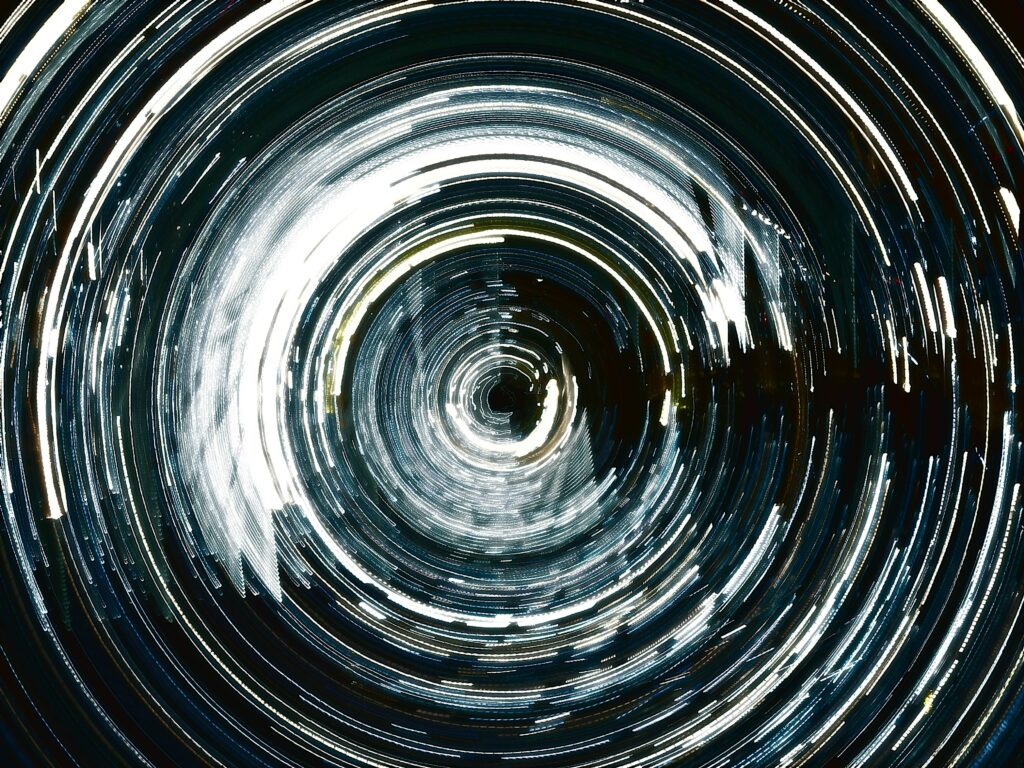 Abstract Swirl Wallpaper: Glowing Circular Lines Background