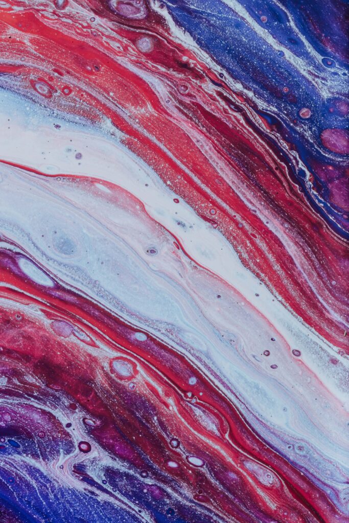 Mesmerizing Abstract Wallpaper: Red, Blue & White Swirling Design