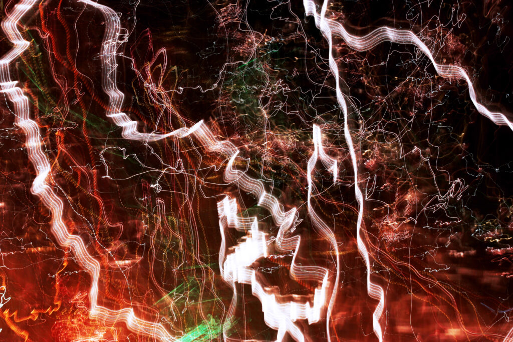 Mesmerizing Abstract Light Trails Wallpaper - Dark Background Design