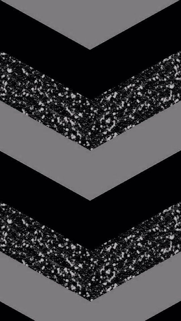 Black glitter wallpaper with geometric chevron down arrows in black matte gray shimmer