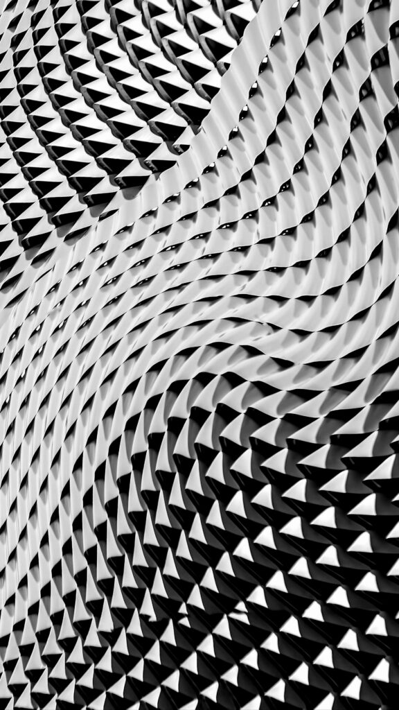 Dynamic Black-and-White Abstract Wallpaper with Geometric Wave Textures