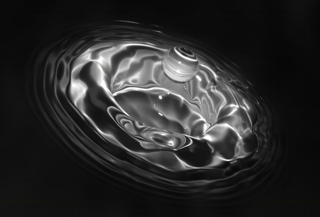 Stunning Black-and-White Water Droplet Splash Wallpaper Background