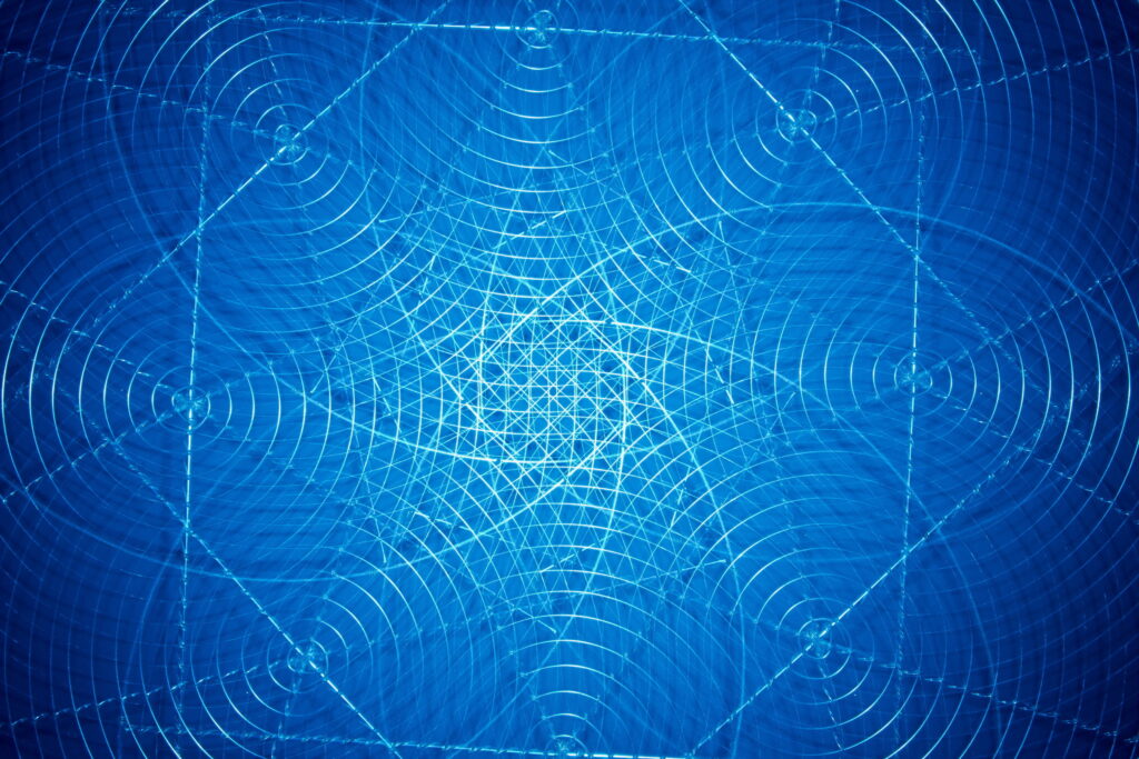 Mesmerizing Blue Abstraction Wallpaper with Intricate Geometric Patterns