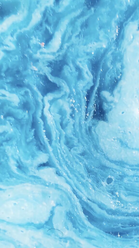 Abstract blue swirl wallpaper with fluid marble patterns creating depth and calming motion background