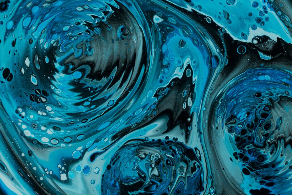 Mesmerizing Blue Fluid Art Wallpaper: Captivating Underwater Design