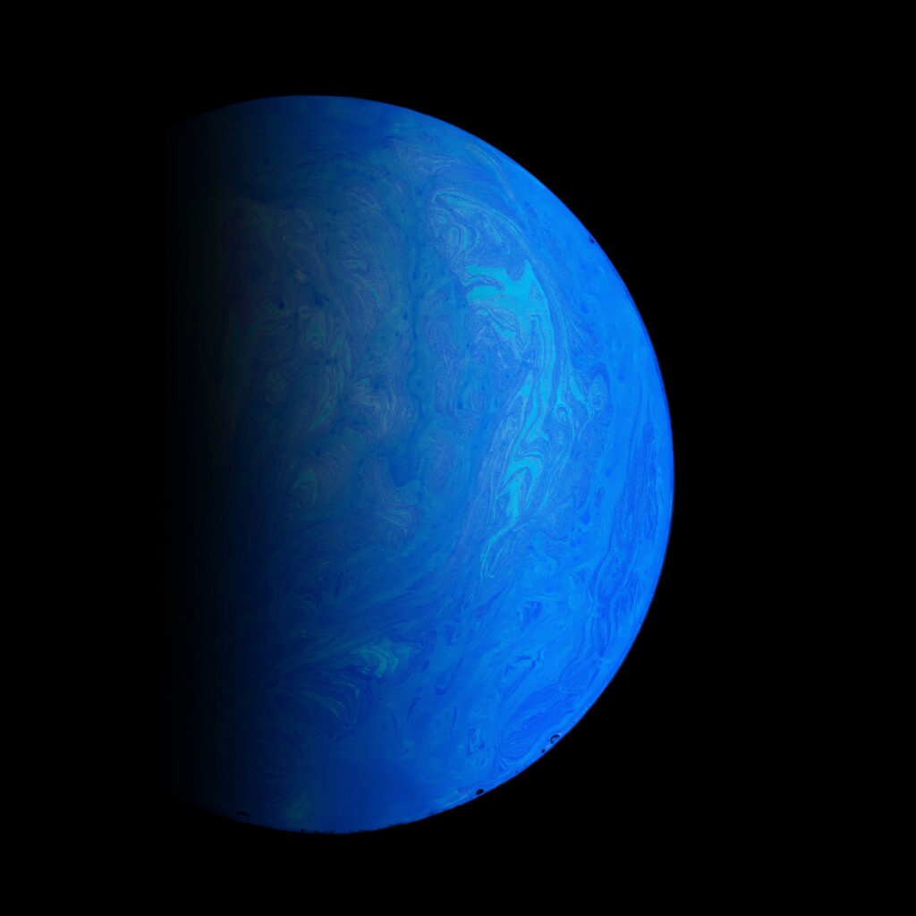 Otherworldly Blue Planet Wallpaper on Black Background