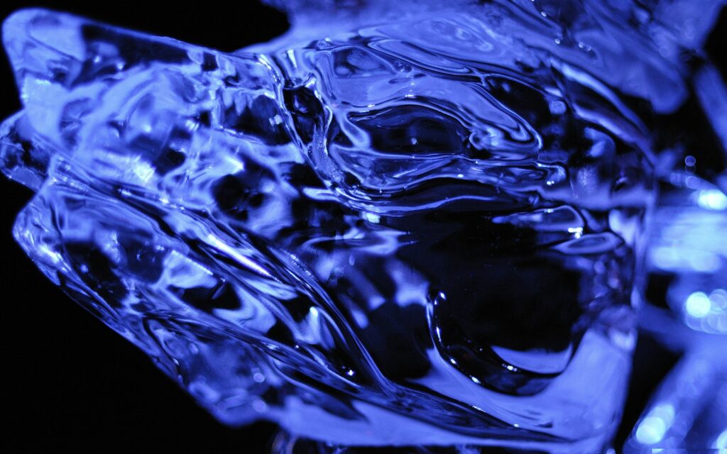 Mesmerizing Blue Water Motion: Intricate Textures Wallpaper Background