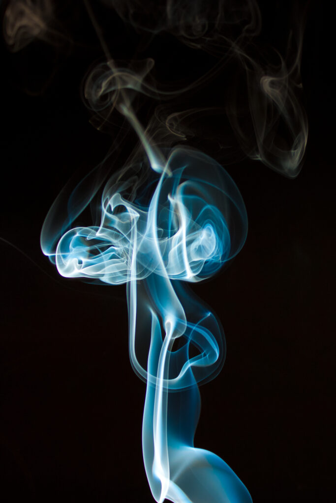Mesmerizing Blue and White Abstract Smoke Wallpaper on Black Background