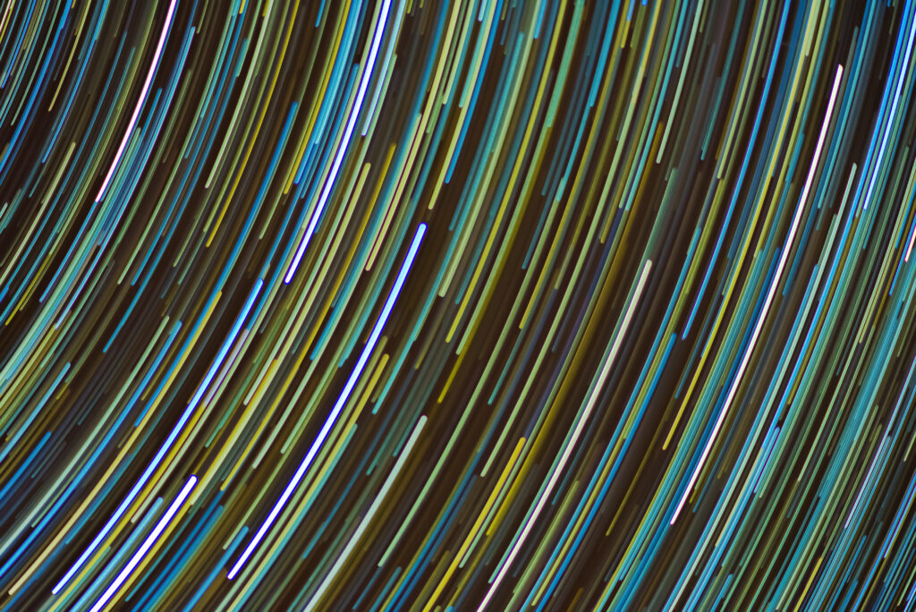 Mesmerizing Blue & Yellow Abstract Wallpaper - Rotating Light Trails