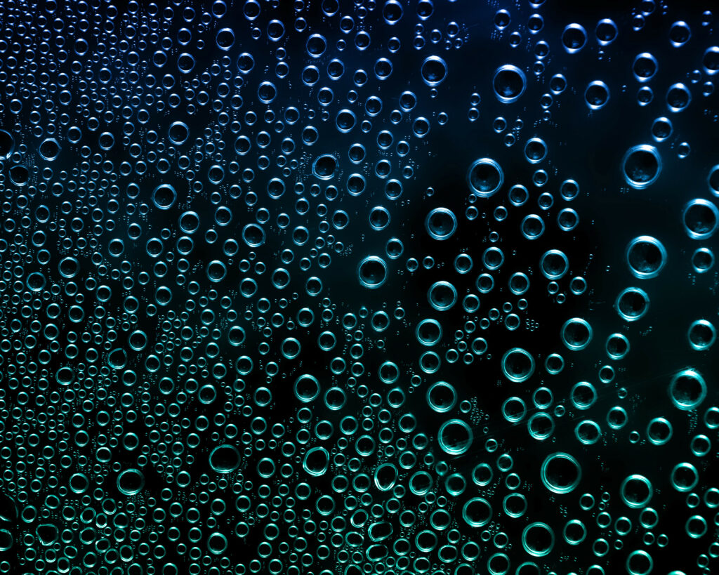 Mesmerizing Bubble Wallpaper: Dark Water & Blue-Green Gradient Background