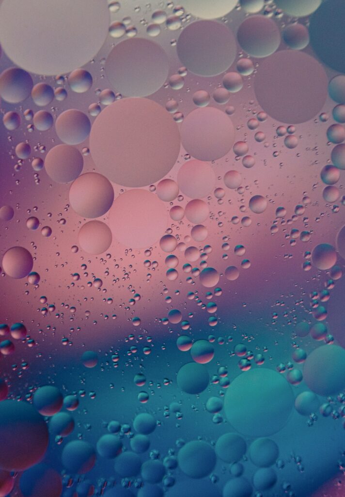 Mesmerizing Bubble Wallpaper: Soothing Pink & Blue Gradient Background