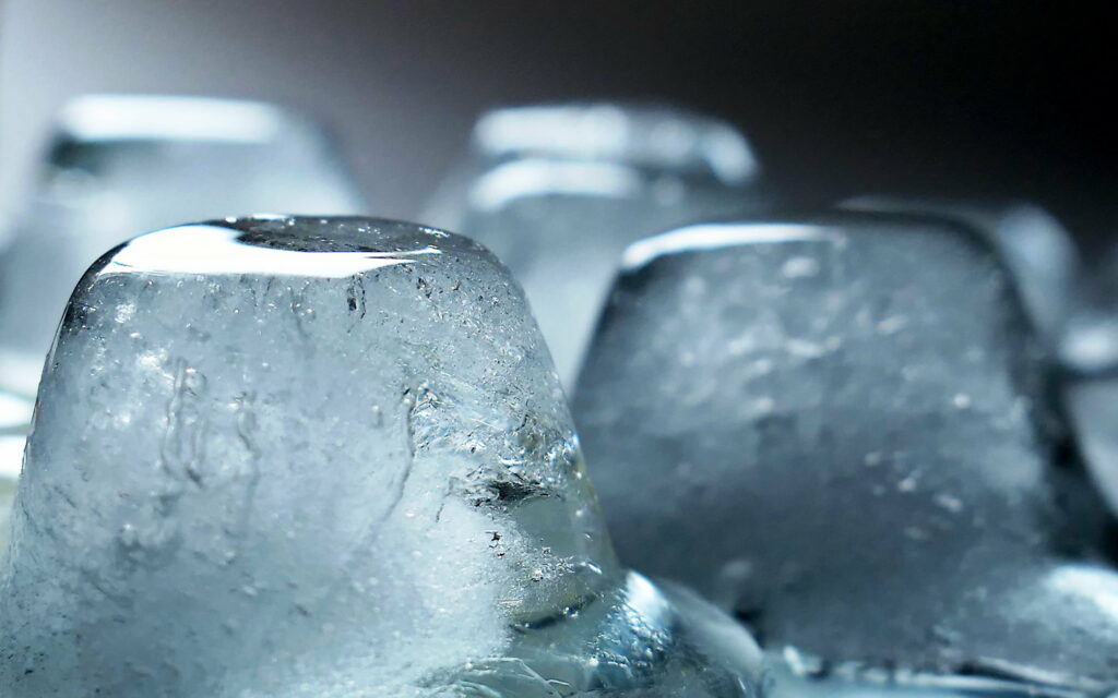 Crystal Clear: A 4K Wallpaper of Closeup Transparent Frozen Ice Crystal.