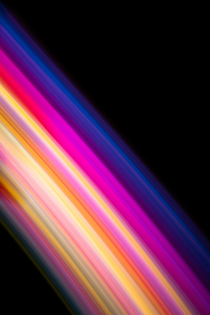Dynamic Colorful Light Stripes Wallpaper on Black Background