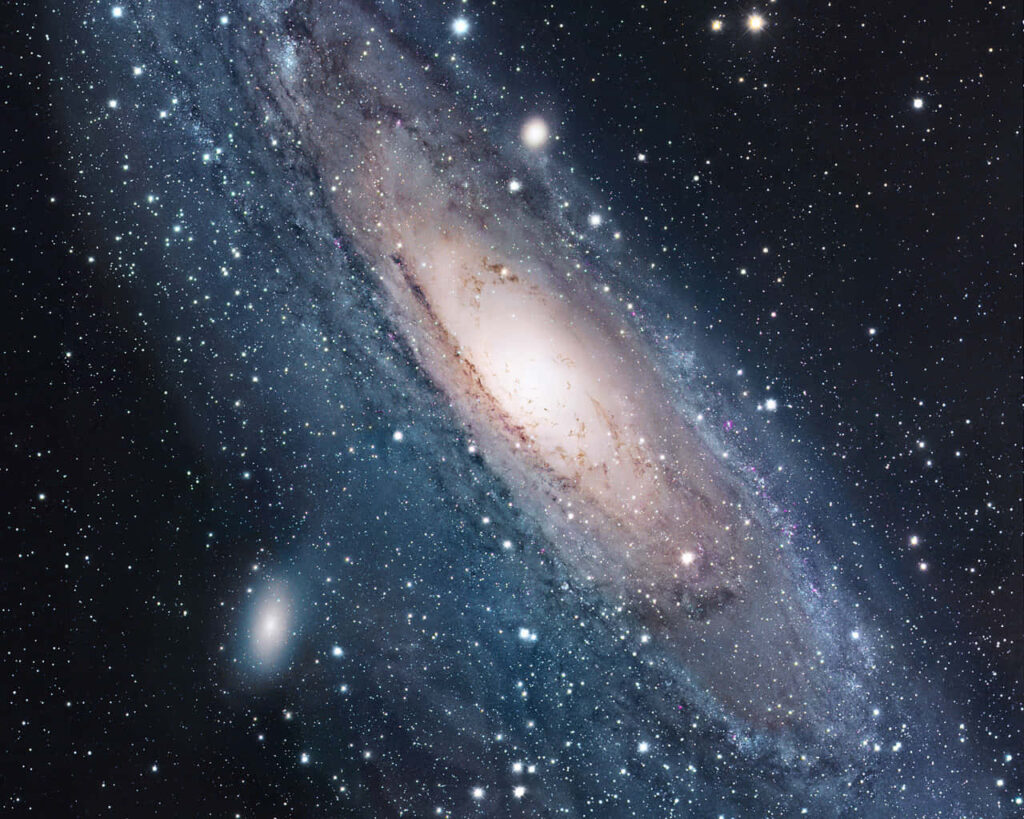 Cosmic wallpaper of a vibrant galaxy with stars and nebulas, showcasing the universe's beauty.