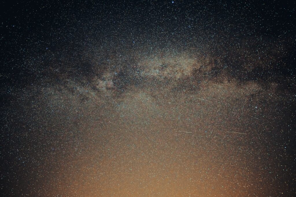 Mesmerizing Cosmic Wallpaper: Stars, Nebula, and Constellations