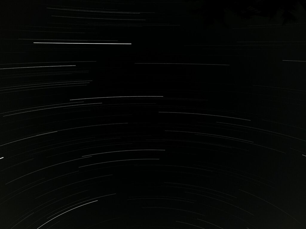 Mesmerizing Curved Stripes Wallpaper on Black Background - 4000x3000