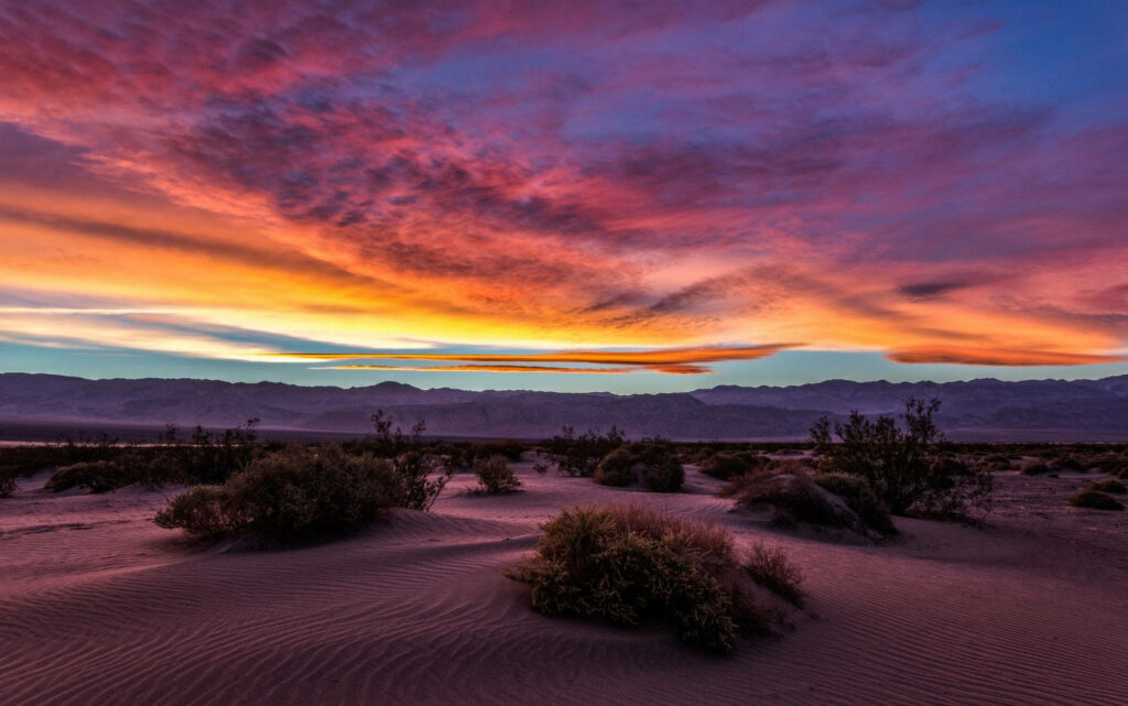 Vibrant Death Valley Sunset Wallpaper: Nature's Tranquil Beauty