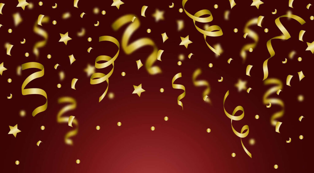 Glamorous Celebration: Captivating Dark Red Desktop with Shimmering Gold Confetti Design Wallpaper