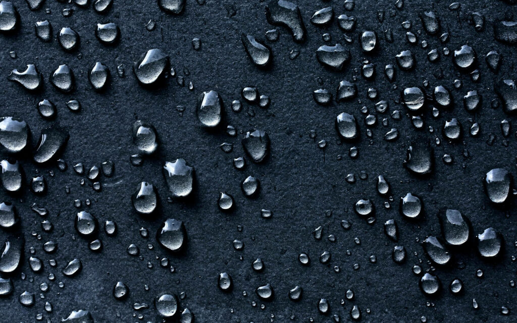 Serenity in Droplets: Captivating Macro 3D HD Water Droplets Wallpaper Enhancing a Smooth Gray Canvas