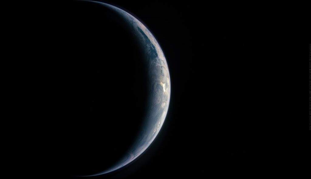 Stunning Earth Eclipse Wallpaper: Serene Curvature & Glowing Horizon