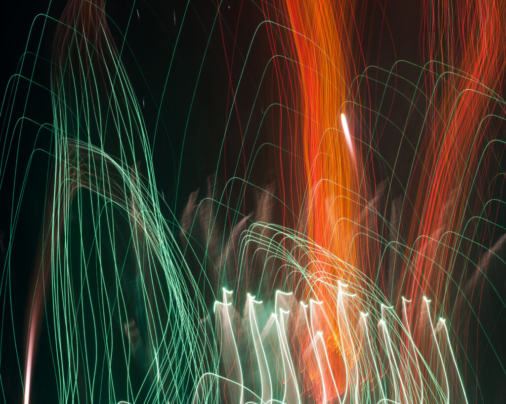 Vibrant Abstract Fireworks Wallpaper: Colorful Night Sky Background