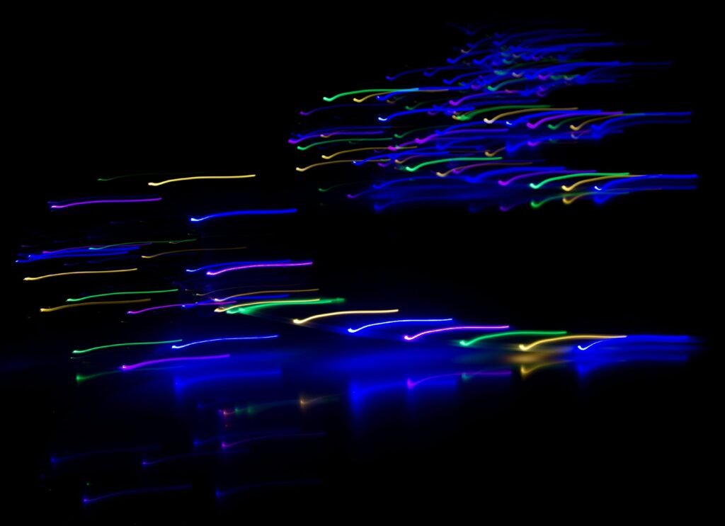 Mesmerizing Freezelight Wallpaper with Vibrant Multicolor Streaks