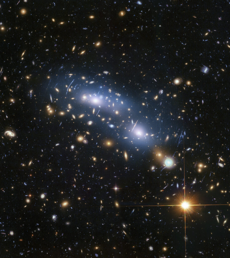 Mesmerizing Galaxy Wallpaper: Distant Stars & Radiant Foreground Star