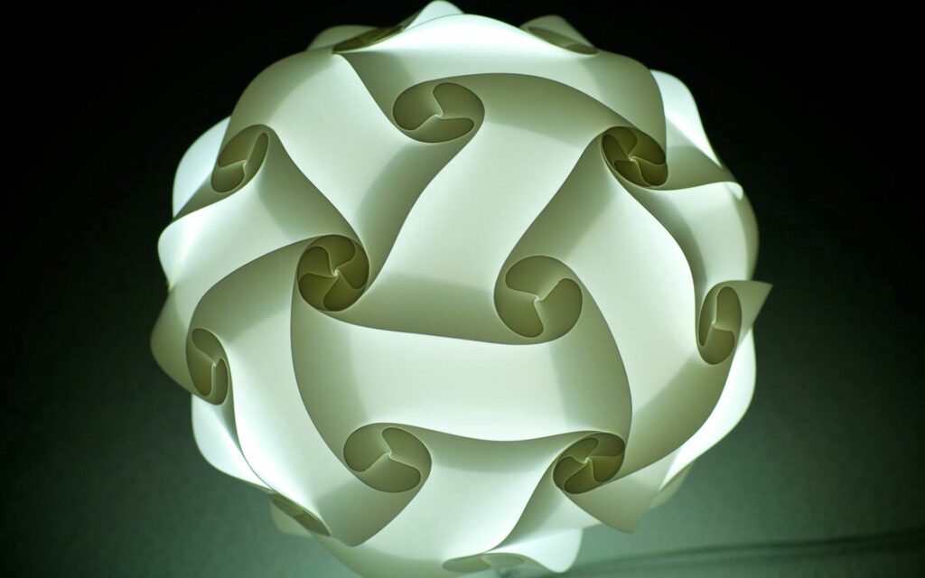 Mesmerizing Geometric Wallpaper: Spherical White Sculpture Background