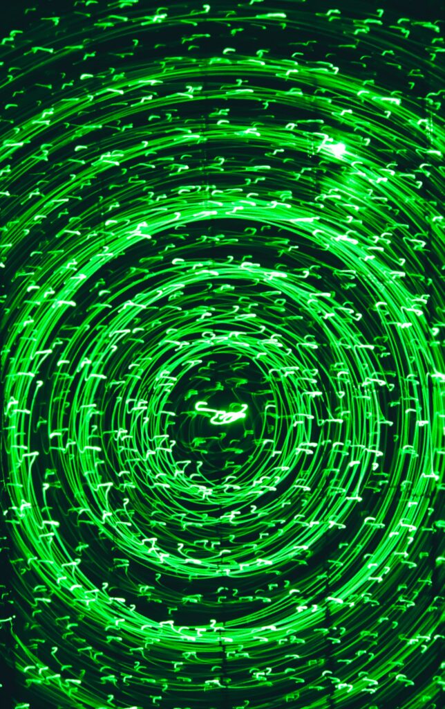 Futuristic Green Circle Wallpaper: Dynamic Freezelight Design