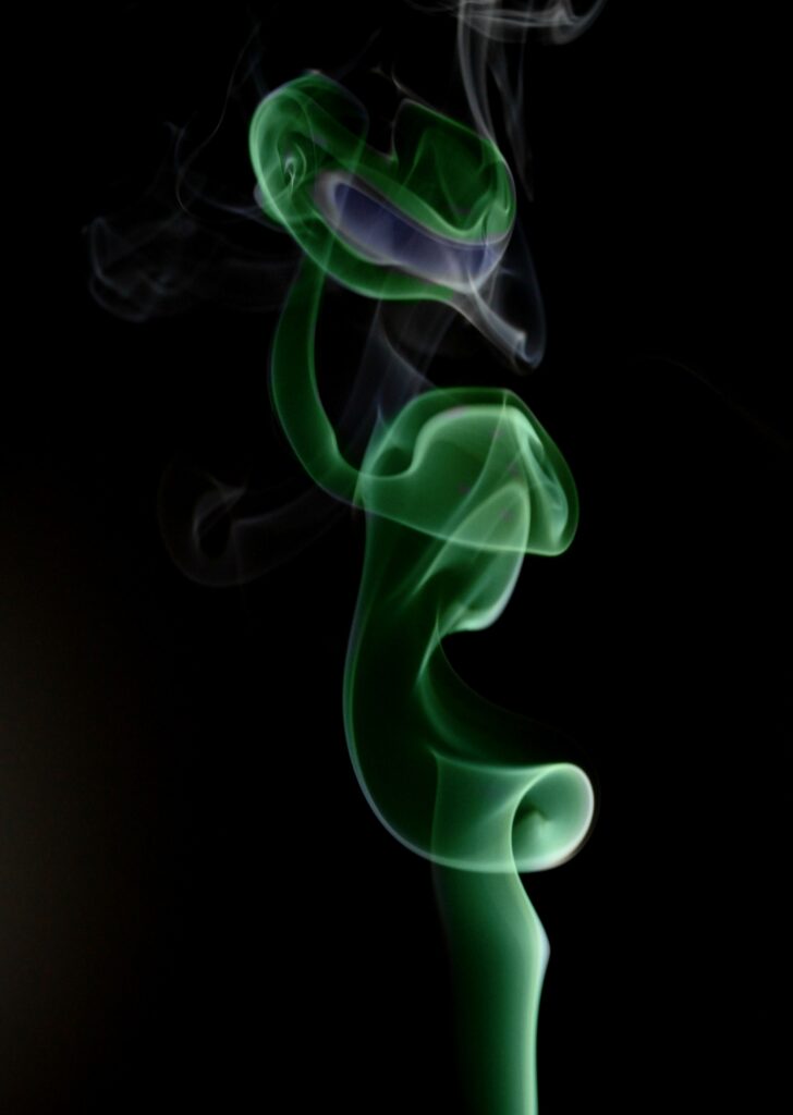 Mesmerizing Green Smoke Wallpaper: Elegant Abstract Background Art