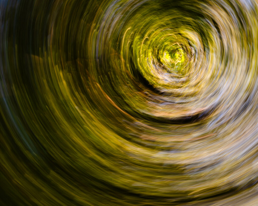 Mesmerizing Swirl Wallpaper: Dynamic Green and Yellow Background