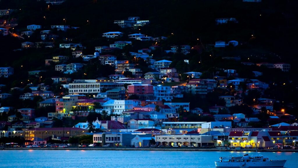 Stunning Harbor Town Evening: Twinkling Lights & Serene Waters Wallpaper