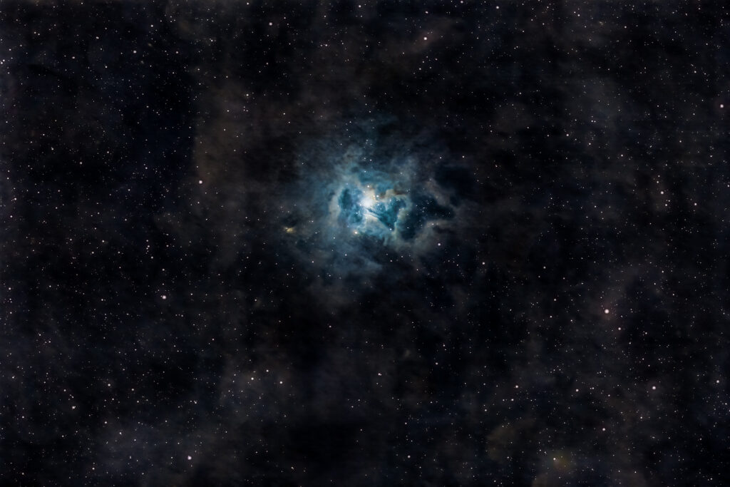 Iris Nebula Wallpaper: Stunning Cosmic View with Shimmering Stars