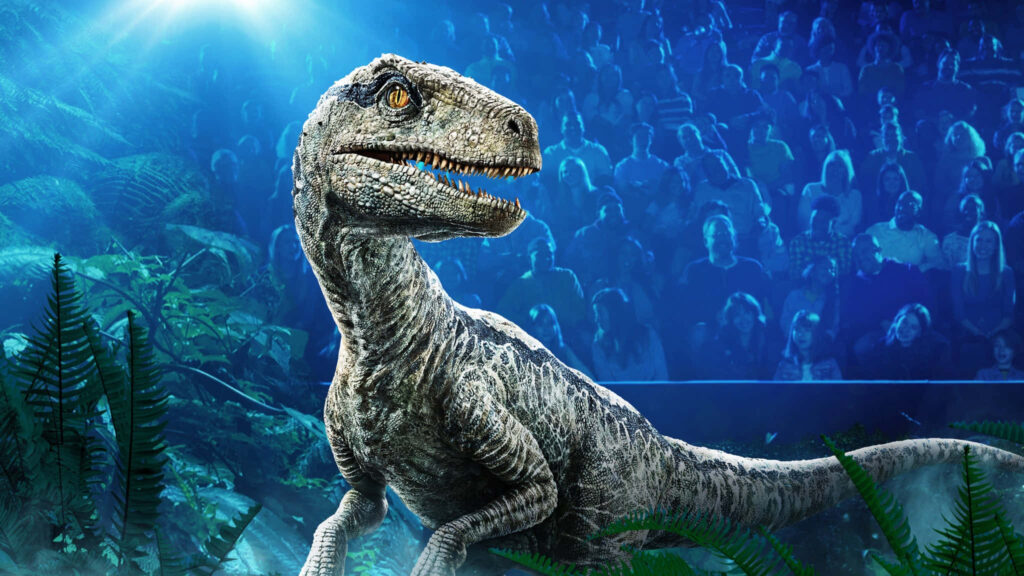 Fierce Velociraptor in Lush Jurassic World Wallpaper Background