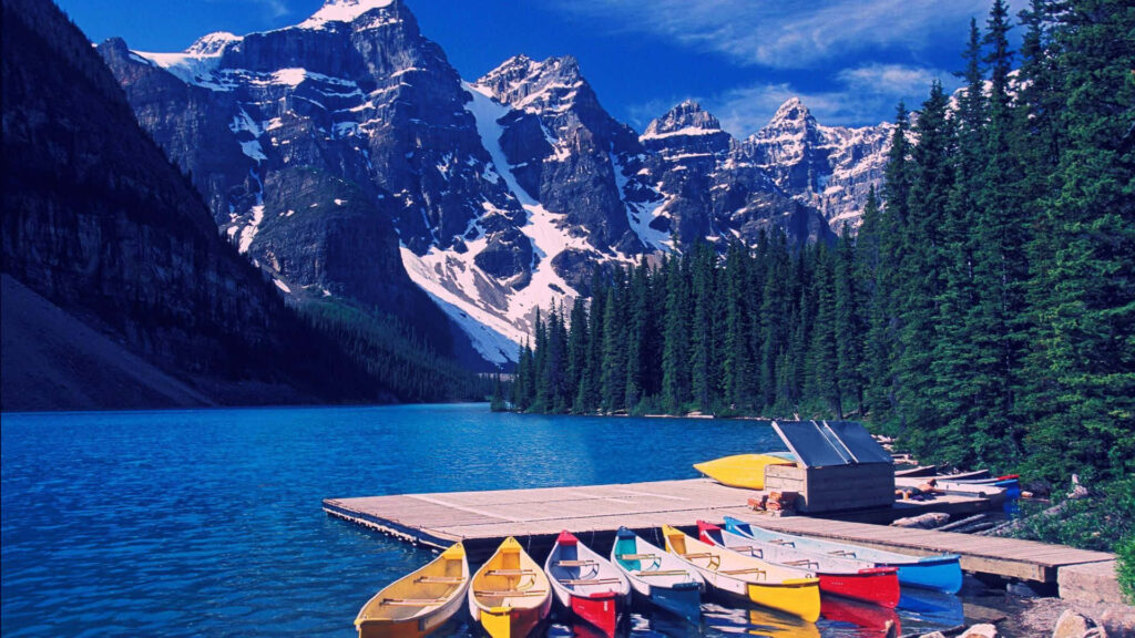 Serene Turquoise Lake & Snow-Capped Mountains Wallpaper Background