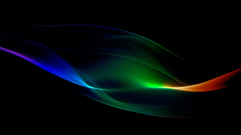 Vibrant Light Waves Illuminating a Sleek Black Desktop Wallpaper