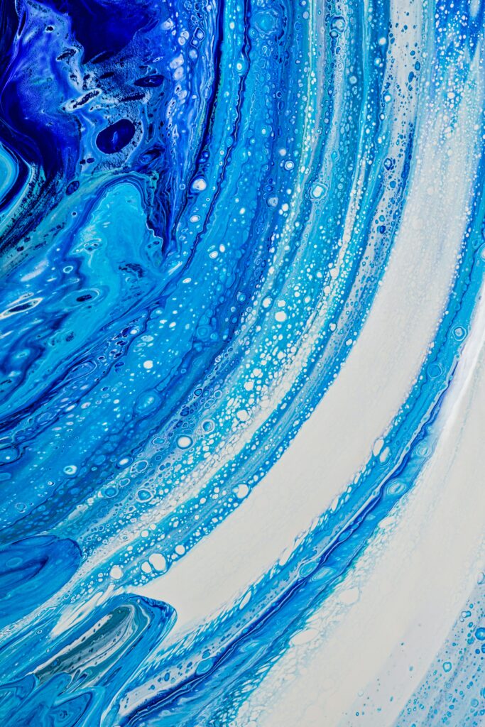 Mesmerizing Macro Wallpaper: Swirling Blue Abstract Paint Stains