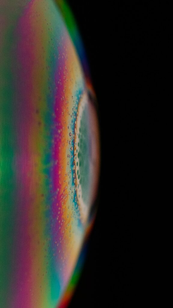 Vibrant Macro Soap Bubble Wallpaper with Intricate Patterns