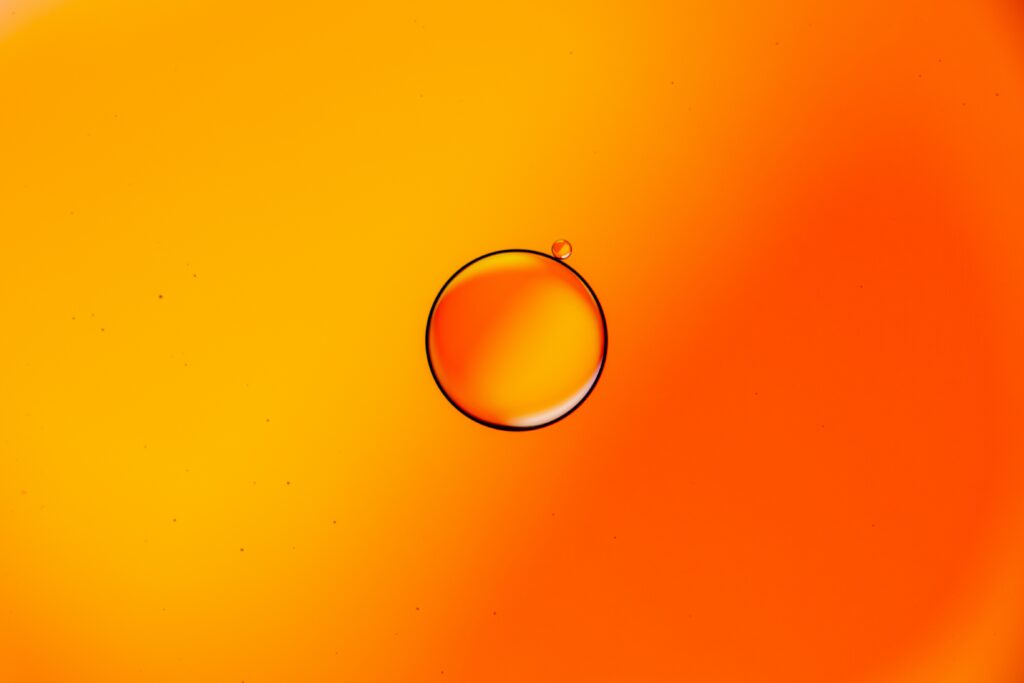 Vivid Orange Macro Wallpaper with Translucent Bubble - Abstract Design
